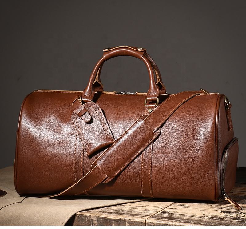 Brown leather weekender bag with shoulder strap